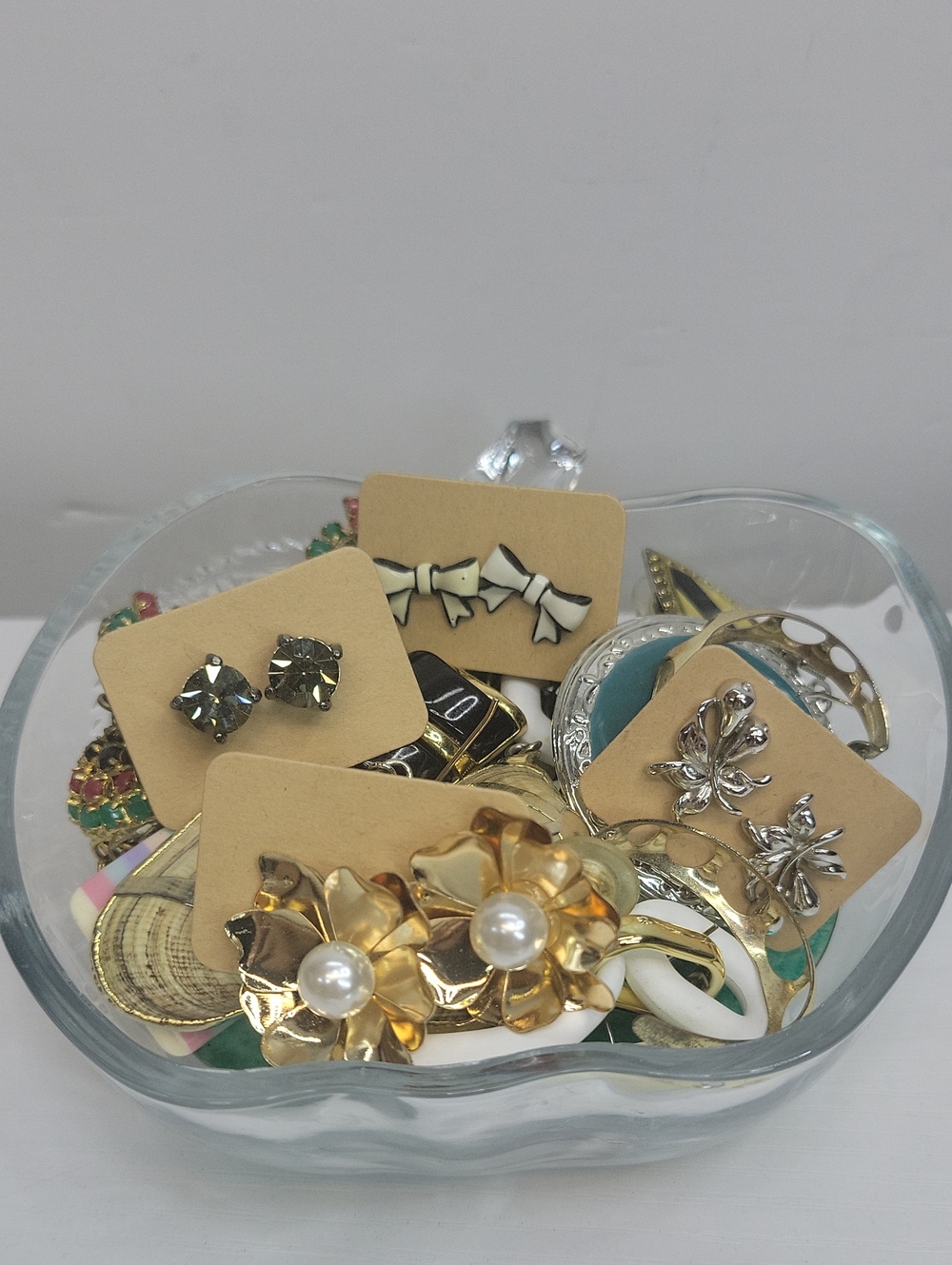 Glass Apple Dish Filled With Earrings